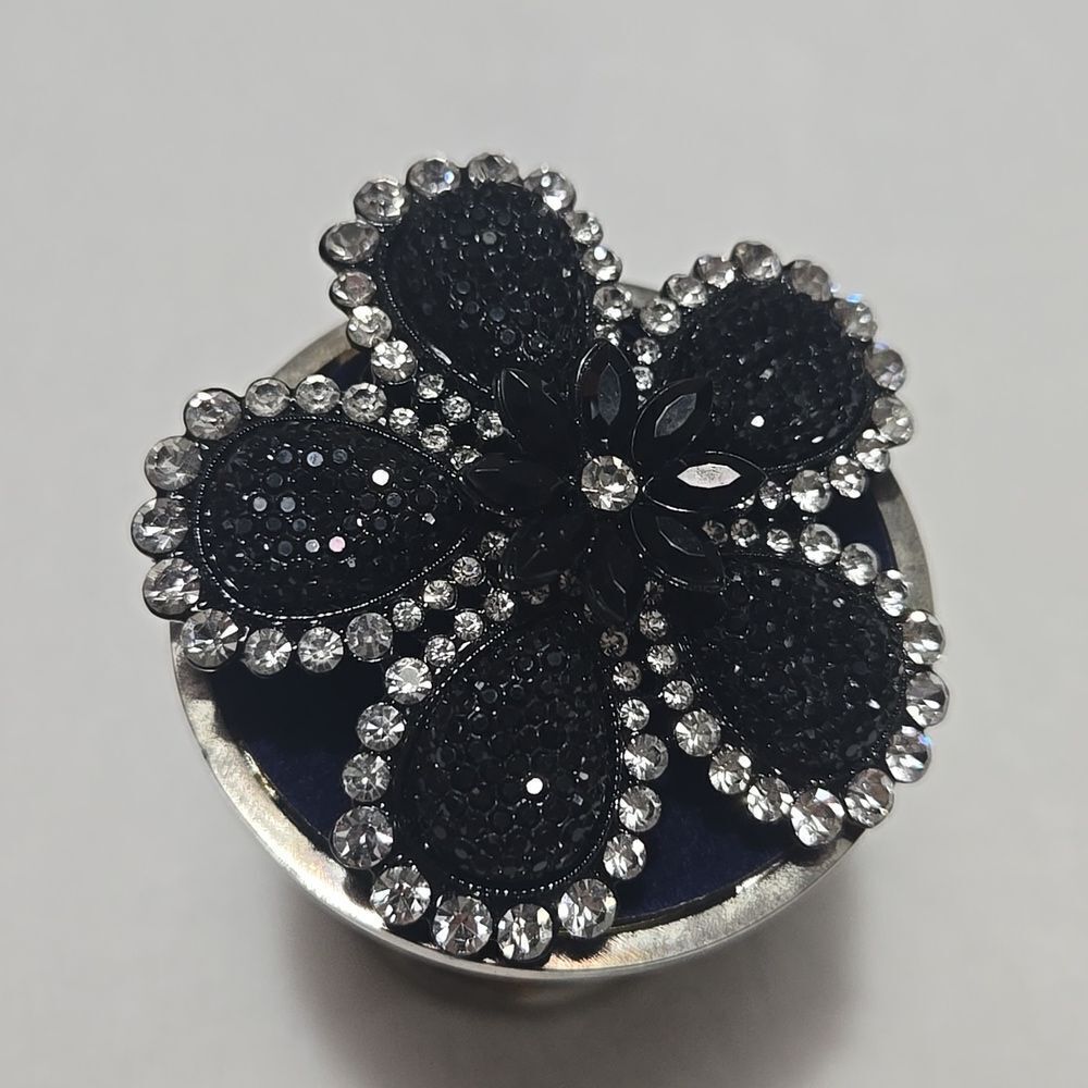 Elegant Black and Silver Flower Brooch